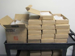 A view of the cardboard boxes used to hide 60 bricks of cocaine seized from a commercial truck at the Ambassador Bridge on April 17, 2023.