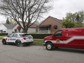 Windsor police and fire investigation vehicles at a home on Chandler Road where a body was found following a late-night fire. Photographed May 2, 2023.