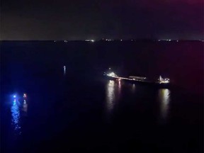 An aerial view from a U.S. Coast Guard helicopter of the MV Cuyahoga from its position on Lake Erie between Pelee Island and Point Pelee due to an engine fire late May 23, 2023.