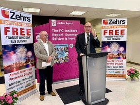 Windsor Mayor Drew Dilkens (right) joins Transit Windsor executive director Tyson Cragg to announce free bus rides across the city on Ford Fireworks Night, June 26, 2023.
