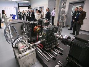 Attendees of the inaugural FuturECar Conference at the University of Windsor tour the newly renovated CHARGE Labs on Friday, May 5, 2023.