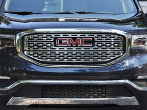 The front grill of a GMC Acadia SUV.