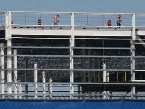 Workers are shown at the NextStar battery plant construction site in Windsor on Monday, May 15, 2023.