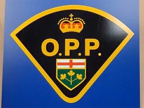 Ontario Provincial Police insignia.