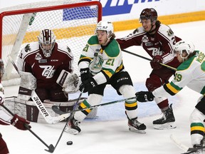 Peterborough Petes goalie Michael Simpson, a London native, stops a shot in front of London Knights forward Ryan Humphrey during Game 6 of the Ontario Hockey League championship series in Peterborough on Sunday May 21, 2023. Clifford Skarstedt/ Peterborough Examiner