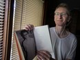 WINDSOR, ONT:. MAY 5, 2023 - University of Windsor professor, Lorenzo Buj, is pictured displaying his poem, The Rogue Remembers, at his home on Friday, May 5, 2023.