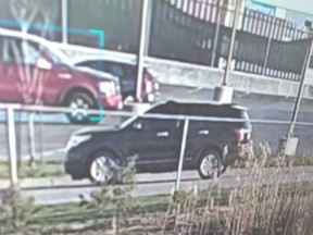A surveillance camera image of a Ford Explorer SUV as it left the scene of a vehicle fire in Lakeshore on May 11, 2023.