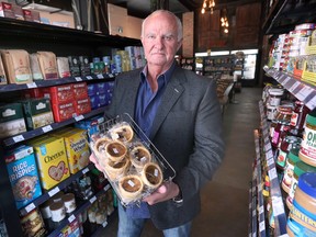 Super-pricey butter tarts. Vern Myslichuk, owner of La Vern's Market, is shown Wednesday, May 17, 2023, with a tray of the snack items that were twice the target of recent door-smashing burglaries.