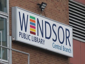 The Windsor Public Library Central Branch sign is pictured on Friday, April 28, 2023.