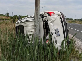 A white Ford Explorer that crashed on the on-ramp to the E.C. Row Expressway at Lauzon Parkway in east Windsor on June 11, 2023. The vehicle was previously reported stolen.