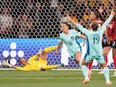 Hayley Raso of Australia celebrates after scoring the first goal past Canada's keeper Kailen Sheridan.