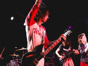 Indie rock band Daniel Romano's Outfit in performance.