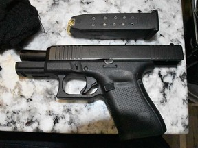 A Glock handgun seized by OPP during raids as part of Project Cabah on June 28, 2023.