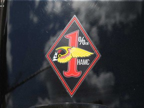 A decal for the Hells Angels Motorcycle Club showing the 'one per cent' outlaw biker motif. Photographed in July 2022.