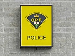 A sign at an Ontario Provincial Police detachment building.