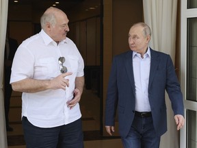 FILE - Russian President Vladimir Putin, right, and Belarusian President Alexander Lukashenko speak during their meeting at the Bocharov Ruchei residence in the resort city of Sochi, Russia, Friday, June 9, 2023. Mercenary leader Yevgeny Prigozhin incited a rebellion against Russia's military leaders and marched with his troops toward Moscow but aborted his mutiny when Belarusian President Alexander Lukashenko brokered an agreement that included exile for the warlord in Belarus.