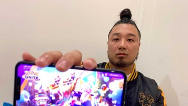 Steve Tran of Windsor shows the video game Pokemon UNITE on his cellphone. Tran is competing in the 2023 World Championships of the game in Yokohama, Japan. Photographed July 27, 2023.