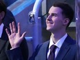 Toronto Maple Leafs' 2020 first round draft pick Rodion Amirov waves as he is acknowledged by the crowd.