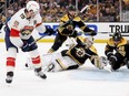 Matthew Tkachuk of the Florida Panthers scores the game-winning goal on Linus Ullmark of the Boston Bruins.