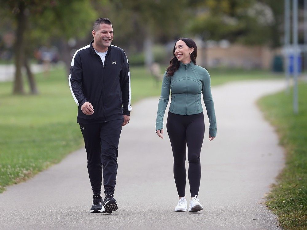Fred Francis and wife Carolyn walk