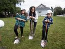 Adriana Arquette and her kids Nina, age 10, and Gio, age six, break ground on their new Habitat for Humanity home in Sandwich Town on Saturday, Sept. 9, 2023.