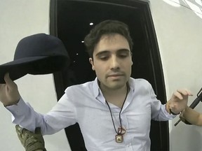 This frame grab from video, provided by the Mexican government, shows Ovidio Guzman Lopez being detained in Culiacan, Mexico, Oct. 17, 2019.