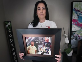 Christy Soulliere holds photo of her son