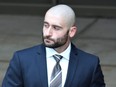 London police Const. Eldin Omerovic, 27, leaves the London courthouse Tuesday, May 9, 2023, after the opening day of his trial on charges of sexual assault and sexual assault with choking. (Dale Carruthers/The London Free Press)