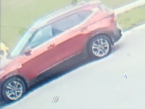 Woodstock police are searching for a red/orange SUV and two suspects involved in the kidnapping of a 15-year-old male in Woodstock on Thursday. (Woodstock police handout photo)