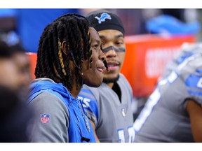 Receiver Jameson Williams, left, is set to make his debut for the Detroit Lions on Sunday against the Carolina Panthers.