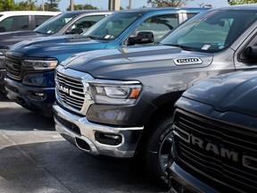 New Ram vehicles sit on a Dodge Chrysler-Jeep Ram dealership's lot on October 03, 2023 in Miami, Florida.