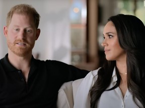 Prince Harry and Meghan Markle in a scene from their Netflix docuseries.