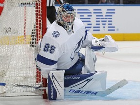 Tampa Bay Lightning goalie Andrei Vasilevskiy watches play.