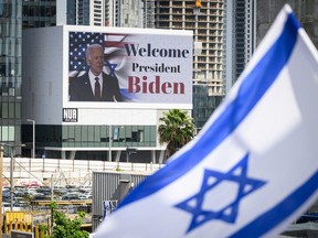 TEL AVIV, Oct. 18: A digital billboard welcomes U.S. President Joe Biden.