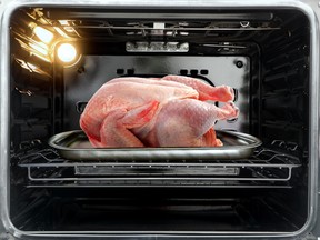 Raw turkey in oven