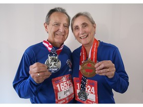 Marathoners John, left, and Mary Vracratsis competed in this year's Detroit Free Press International Half Marathon.