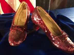 A pair of ruby slippers once worn by actress Judy Garland in "The Wizard of Oz" sit on display at a news conference on Sept. 4, 2018, at the FBI office in Brooklyn Center, Minn.