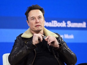 Elon Musk onstage during The New York Times Dealbook Summit 2023, on Nov. 29.