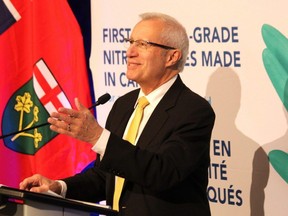 Vic Fedeli, Ontario minister of economic development, speaks at a new conference on Friday, Dec. 1, 2023, at Western University's Collider Centre in London at which federal and provincial officials announced a combined $72 million in funding for a medical glove production plant Manikheir Canada is building in south London. (Dale Carruthers/The London Free Press)