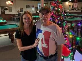 Laura Tamasi and her boyfriend Richard Gray at the Hustler Billiards, where Tamasi’s tips helped fund a pool tournament that contributed to a food and toy drive. (Jack Moulton/The London Free Press)