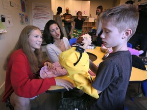 Holy Names students donate puppets