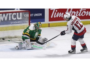 Windsor Spitfires' forward Ryan Abraham beats London Knights' goalie Michael Simpson on a penalty shot during Thursday's game at the WFCU Centre.