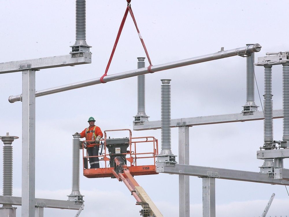 A worker is shown at the NextStar battery plant construction site in Windsor on November 20, 2023.