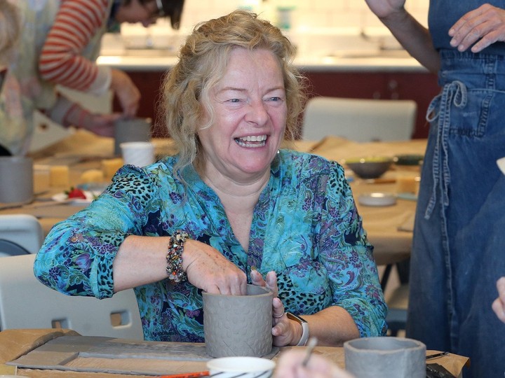  Lauren Snyder-Gault participates in a pottery session at Art Windsor-Essex’s Seniors Council gathering on Thursday, Feb. 22, 2024.