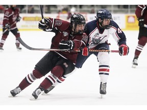 Chatham Maroons' Braeden Burke (18) battles LaSalle Vipers' Shaun Horne (49) during a game this season. Burke is one of eight Essex County players on the Chatham roster.
