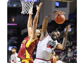 Windsor Express centre Sam Muldrow, at right, battles the Newfoundland Rogues' Lewis Djonkam during Wednesday's game at the WFCU Centre.