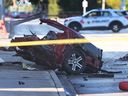 A destroyed vehicle was displayed on Riverside Avenue near McDougall Street on Sunday, October 15, 2023.