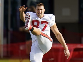 Tampa Bay Buccaneers tight end Rob Gronkowski (87) stretches during an NFL football training camp practice Thursday, Aug. 5, 2021, in Tampa, Fla. Gronkowski, a four-time Super Bowl-winning tight end, returns for FanDuel's Kick of Destiny 2. Last year, Gronkowski was unsuccessful in his attempt to make a 25-yard field goal during the first-ever live Super Bowl commercial.