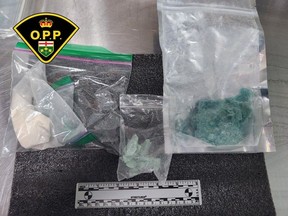 Lambton OPP issued this photo after it said five people were arrested amid a $75,000 fentanyl and cocaine drug seizure in Walpole Island on Feb. 15, 2024. (Lambton OPP)