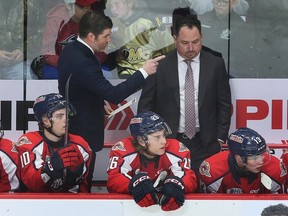 Windsor Spitfires' general manager Bill Bowler, left, will against be on the bench with interim head coach Casey Torres, left, while assistant coach Kris Newbury sits out a four-week suspension handed down by Hockey Canada.
